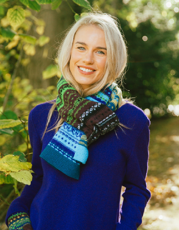 woman wearing fair isle autumn toned wool scarf