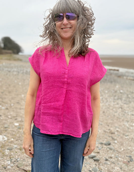 pink v neck linen top with capped sleeves