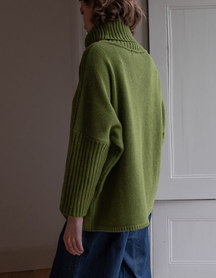 loose fit turtle neck oversized sweater in moss green made from merino lambswool
