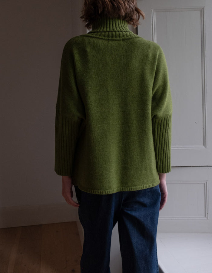 loose fit turtle neck oversized sweater in moss green made from merino lambswool