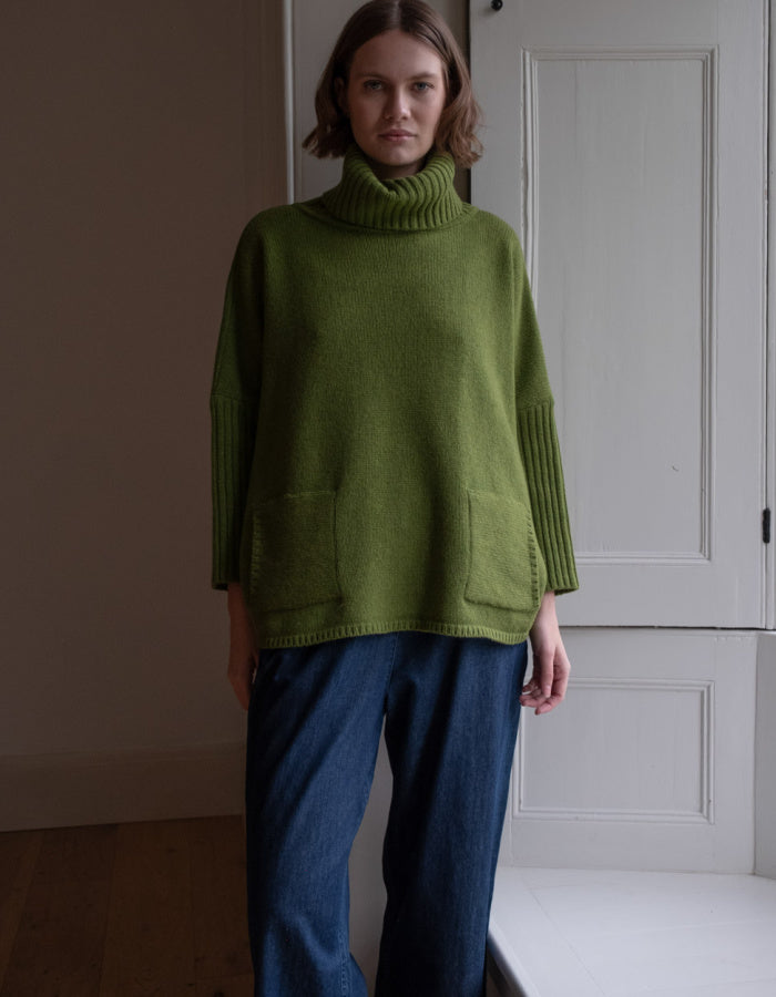 loose fit turtle neck oversized sweater in moss green made from merino lambswool