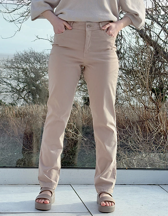 sandy coloured neutral cotton straight leg trouser with 5 pockets and button fly closure