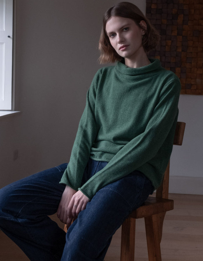 fine merino green jumper with turtle neck and long sleeves