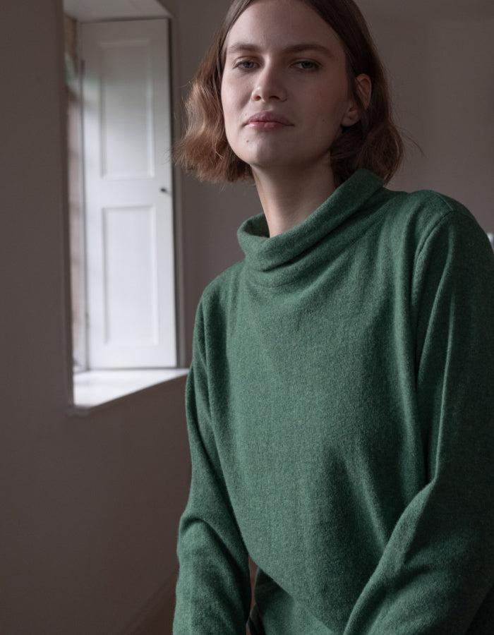fine merino green jumper with turtle neck and long sleeves