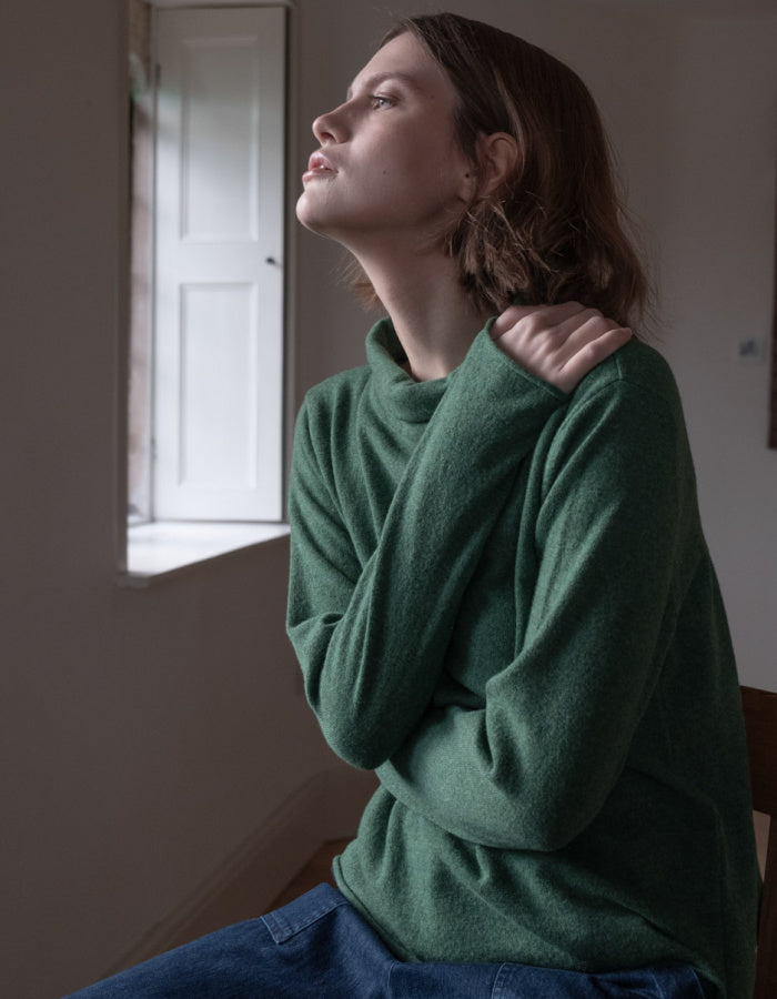 fine merino green jumper with turtle neck and long sleeves