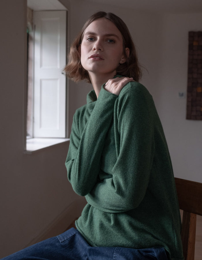 fine merino green jumper with turtle neck and long sleeves