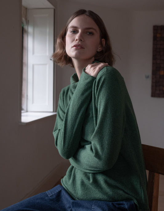 fine merino green jumper with turtle neck and long sleeves