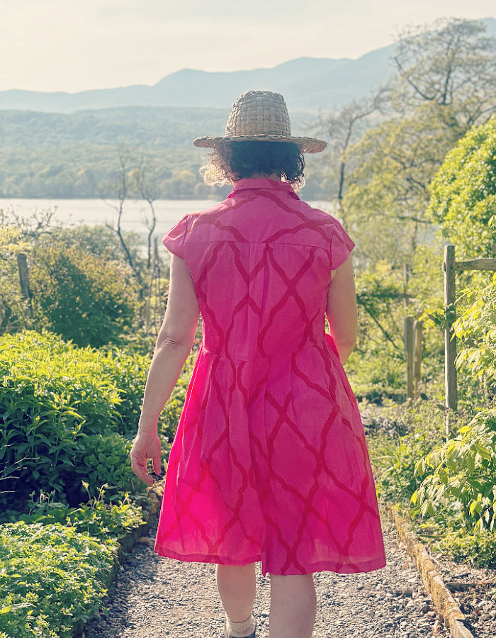 everyday shirt style knee length summer dress with capped sleeves in hot pink cotton with red details