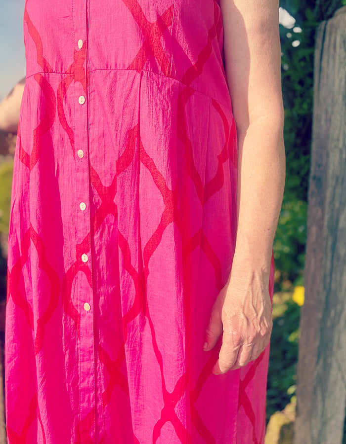 everyday shirt style knee length summer dress with capped sleeves in hot pink cotton with red details