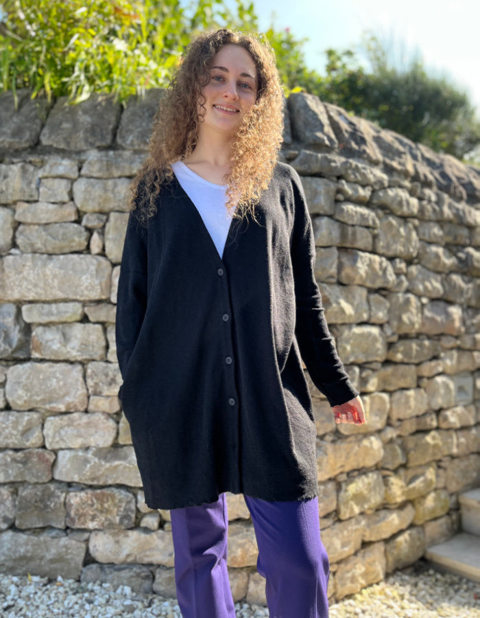 fine merino long cardigan that can be worn loose with v neckline or wrapped to the side for a more fitted look