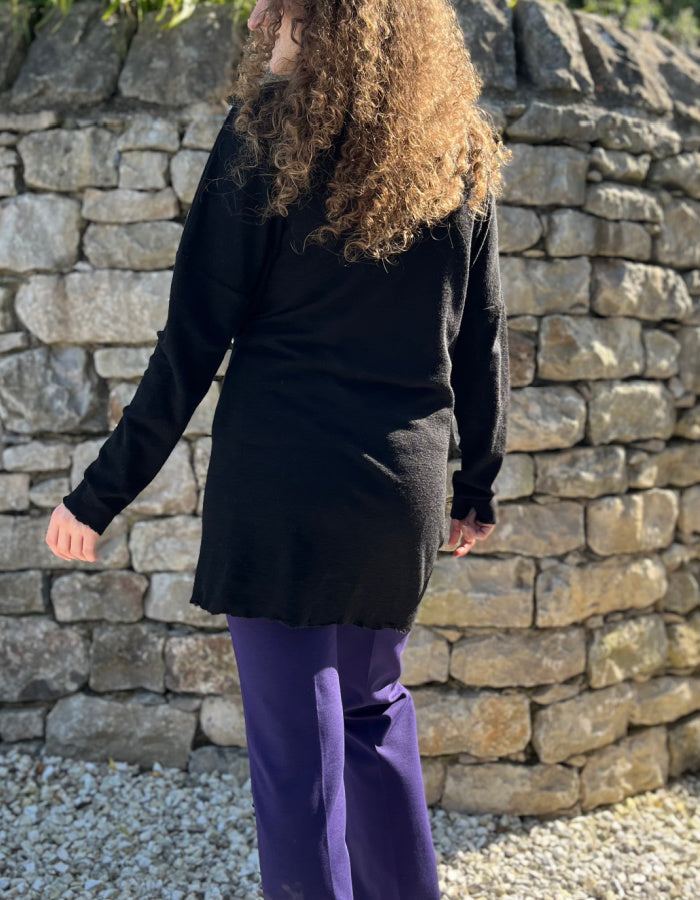 fine merino long cardigan that can be worn loose with v neckline or wrapped to the side for a more fitted look