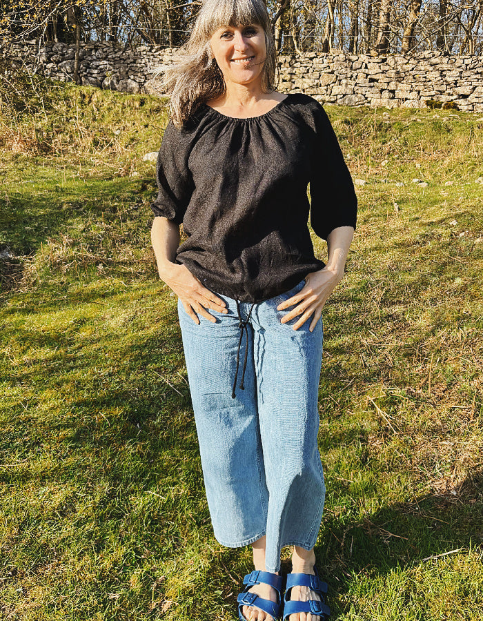 linen boho top with 3/4 sleeves and elasticated neckline to wear on off off the shoulder in black