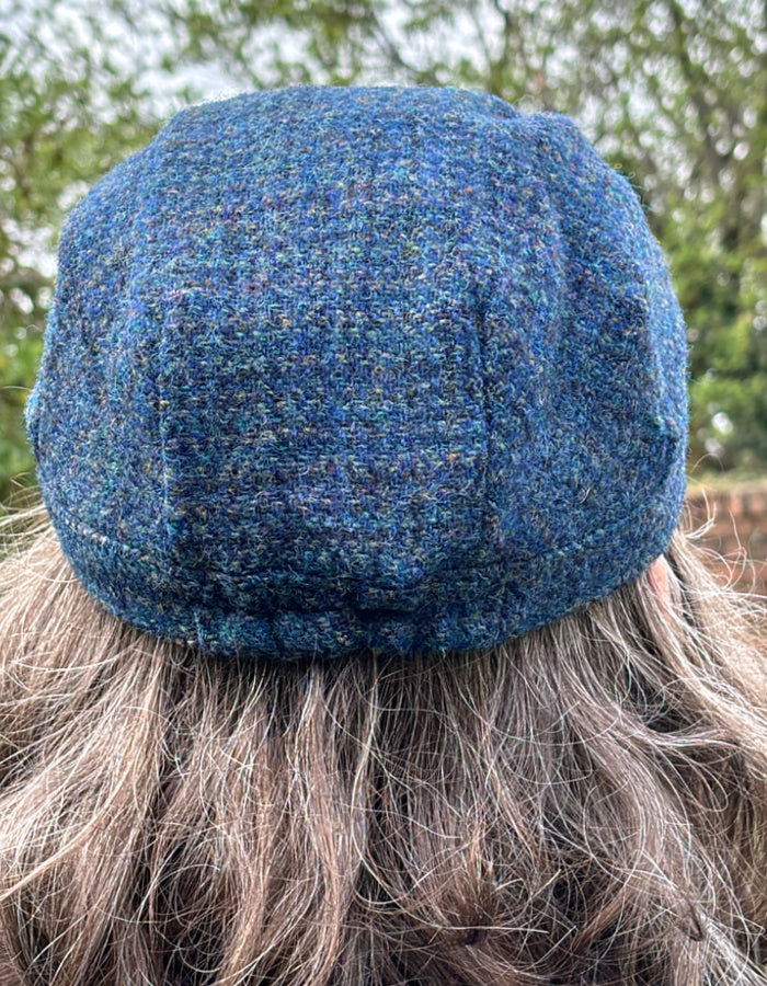 blue Harris Tweed cadet shaped hat with peak