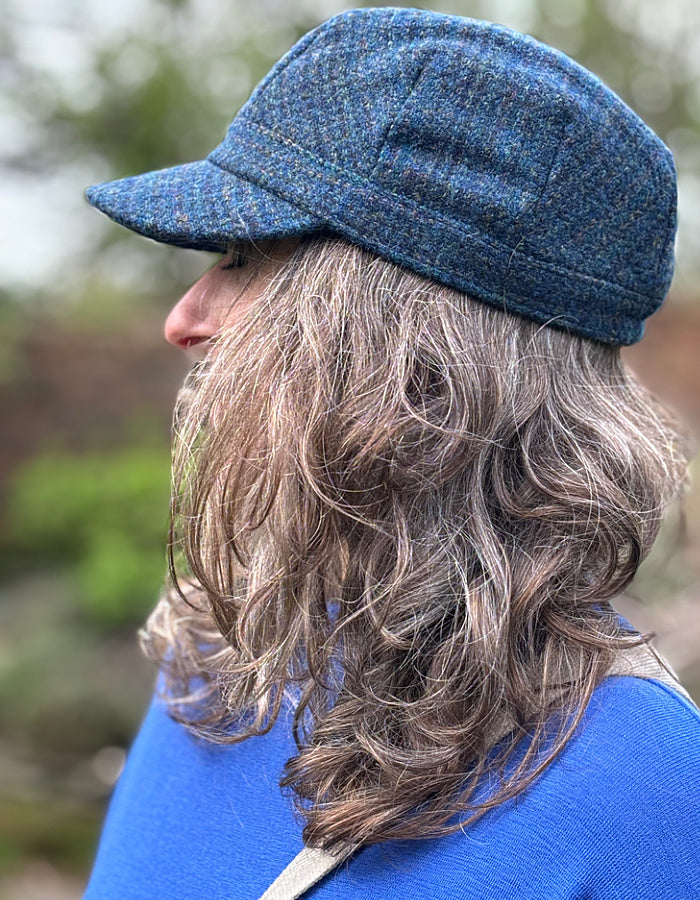 blue Harris Tweed cadet shaped hat with peak