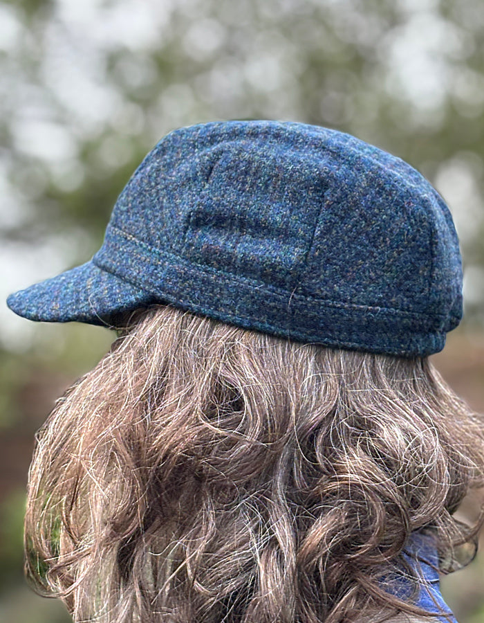 blue Harris Tweed cadet shaped hat with peak