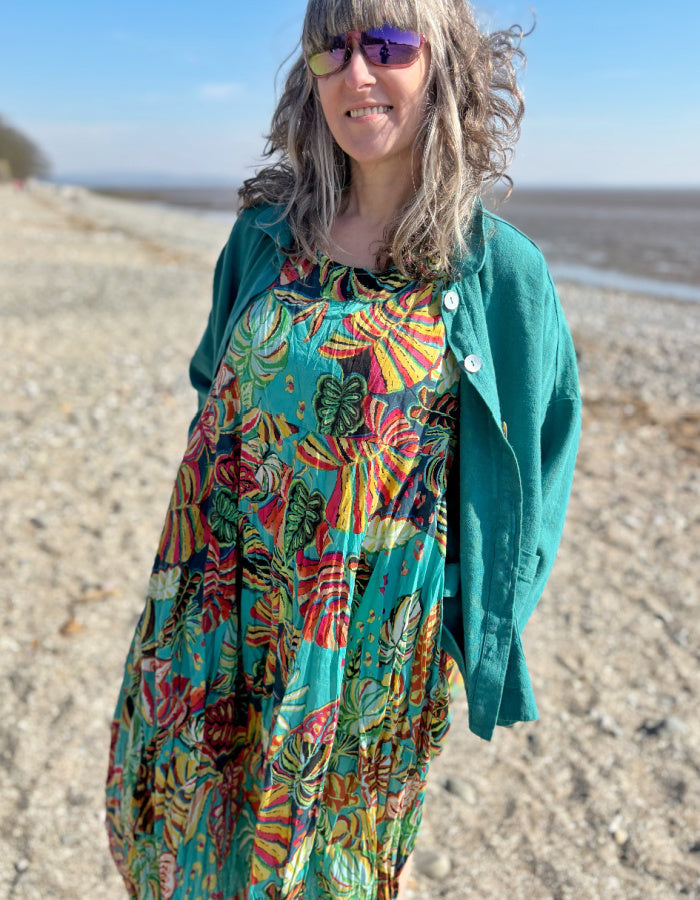 cotton sleeves midi length bubble dress with empire line. print in turquoise red and green tropical rainforest inspired