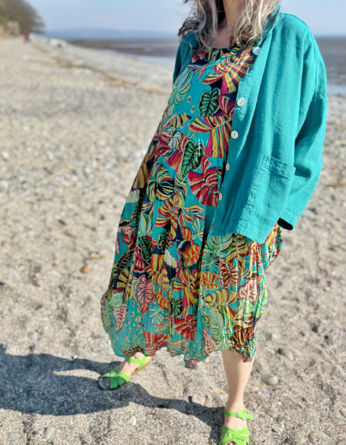 cotton sleeves midi length bubble dress with empire line. print in turquoise red and green tropical rainforest inspired