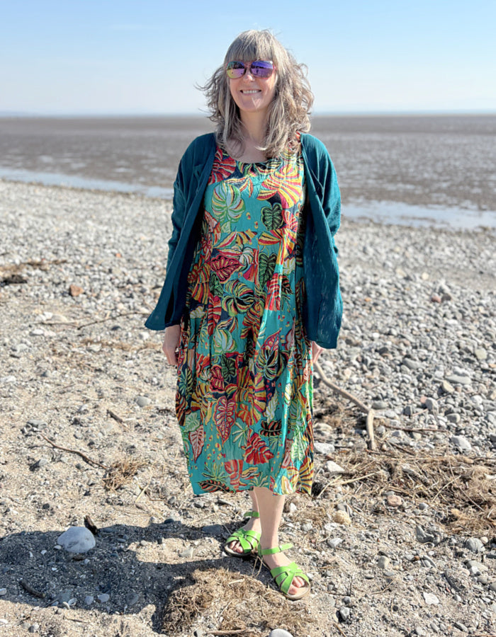 cotton sleeves midi length bubble dress with empire line. print in turquoise red and green tropical rainforest inspired