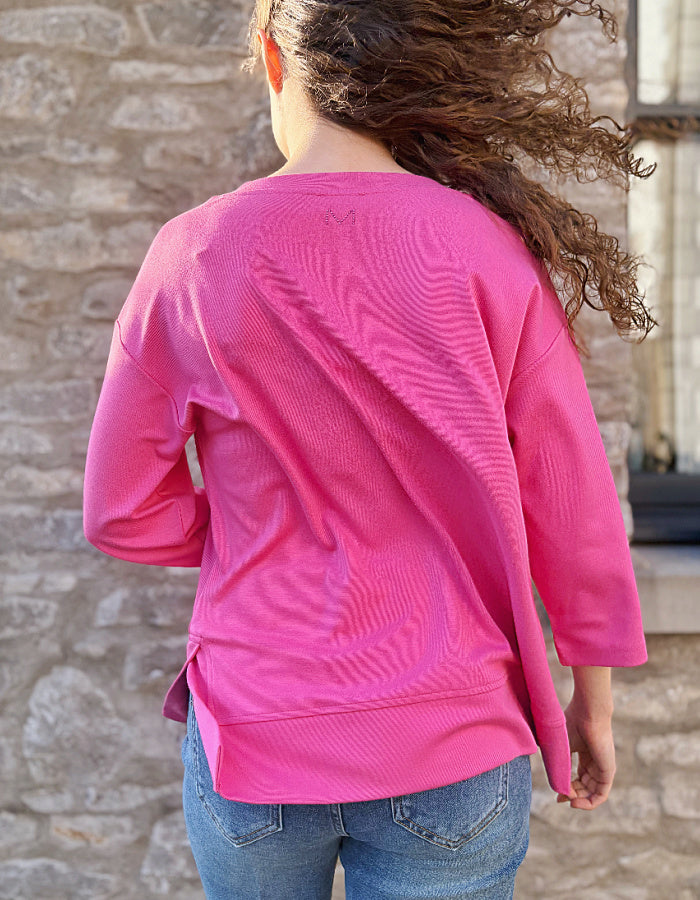 pink V neck sweatshirt with 3/4 length sleeves