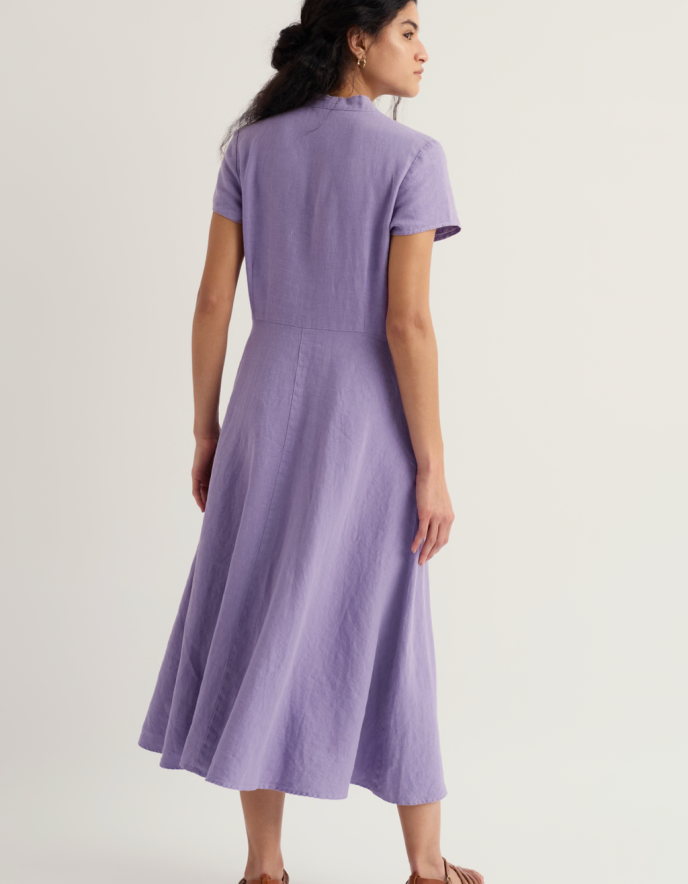 woman wearing a lilac linen tea dress style midi dress