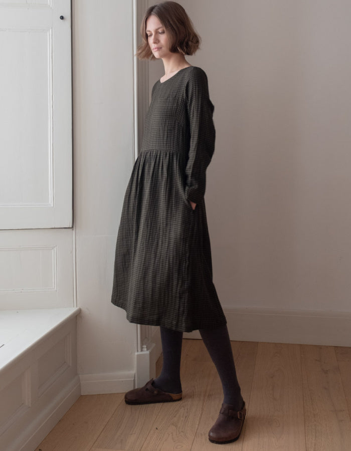 loose fit flared midi length dress with pockets in cotton olive mini check plaid design