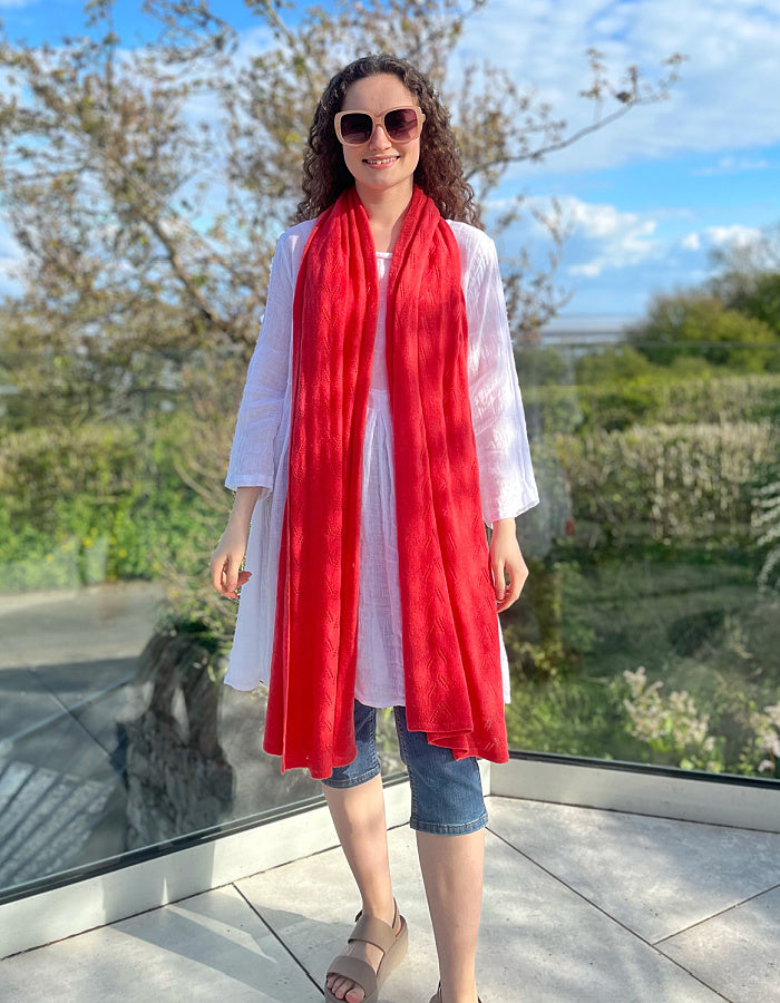 coral cashmere blend scarf or wrap with delicate lace stitch detail