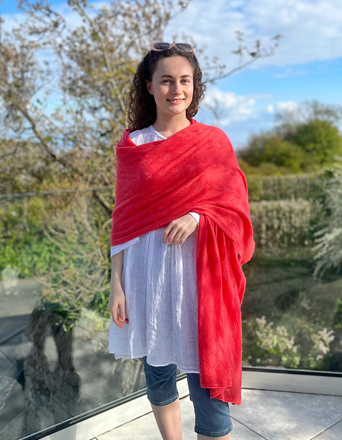 coral cashmere blend scarf or wrap with delicate lace stitch detail