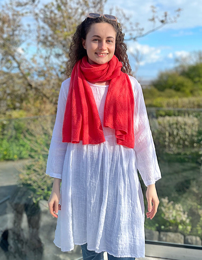 coral cashmere blend scarf or wrap with delicate lace stitch detail