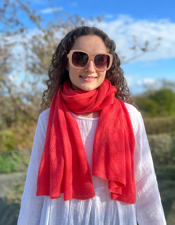 coral cashmere blend scarf or wrap with delicate lace stitch detail