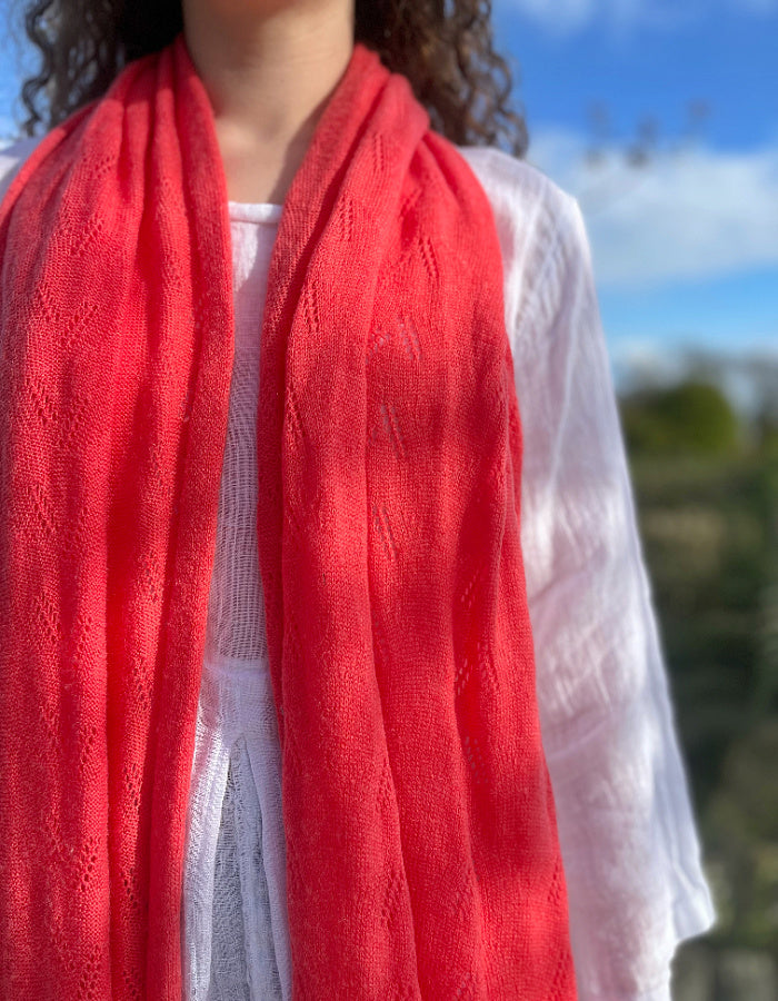 coral cashmere blend scarf or wrap with delicate lace stitch detail