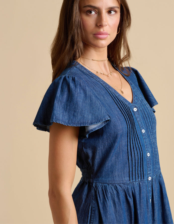 knee length denim dress with neckline, button through at the front and fluted sleeves, gathered waist. everyday dress