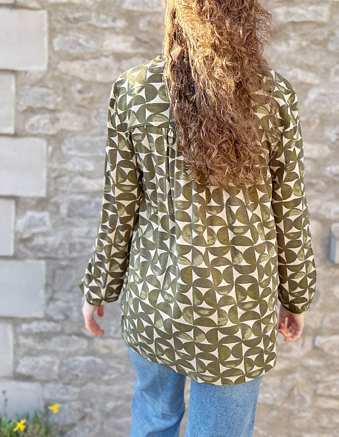 jersey tunic top with v neckline and elasticated cuffs, graphic print in sand and olive green