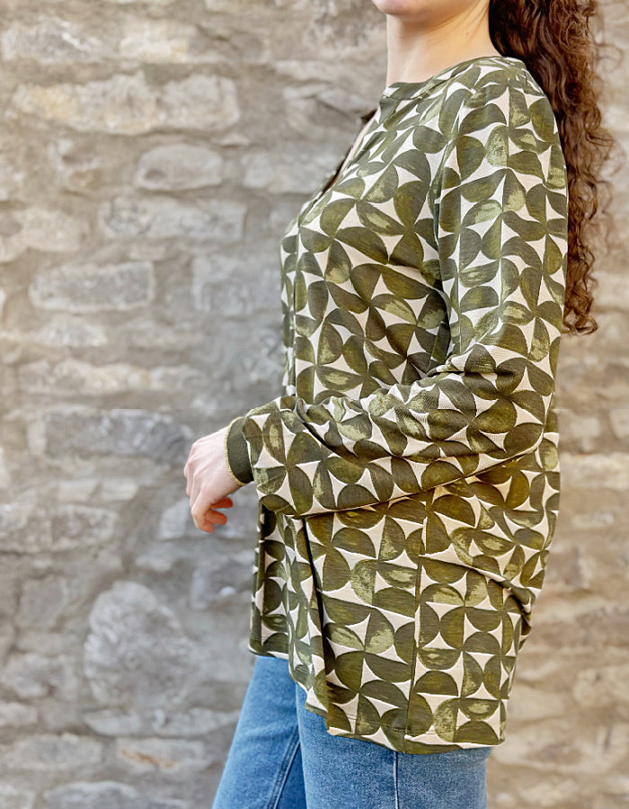 jersey tunic top with v neckline and elasticated cuffs, graphic print in sand and olive green