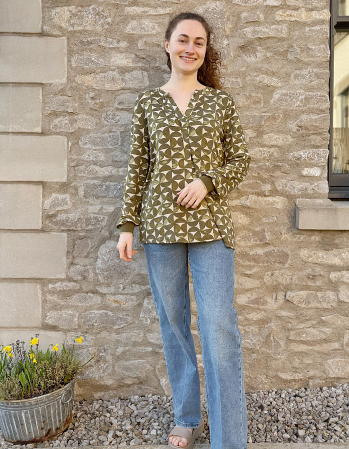 jersey tunic top with v neckline and elasticated cuffs, graphic print in sand and olive green