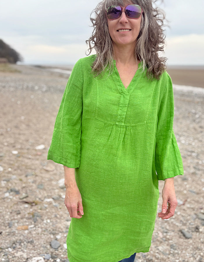 green linen tunic knee length with 3/4 length sleeves and V neck