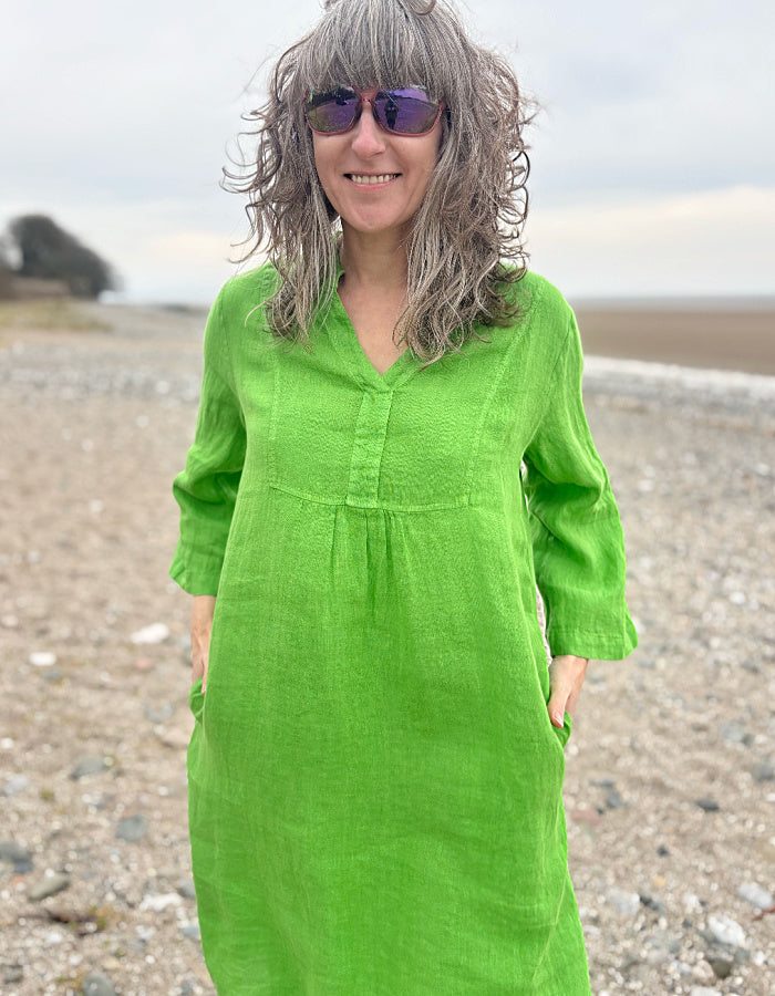 green linen tunic knee length with 3/4 length sleeves and V neck