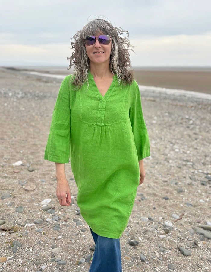 green linen tunic knee length with 3/4 length sleeves and V neck
