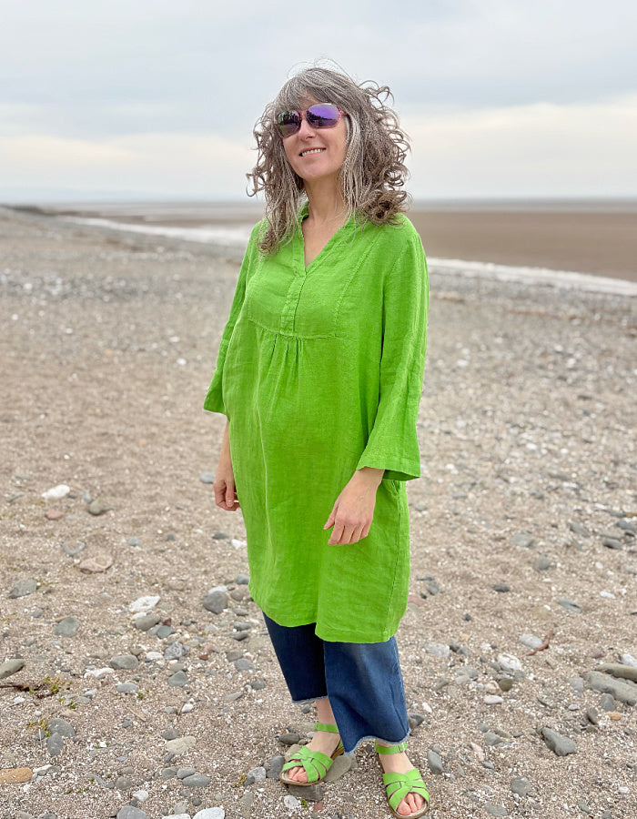green linen tunic knee length with 3/4 length sleeves and V neck