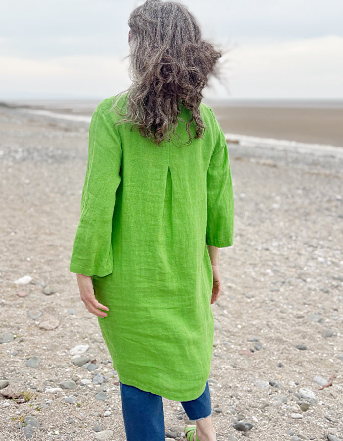 green linen tunic knee length with 3/4 length sleeves and V neck