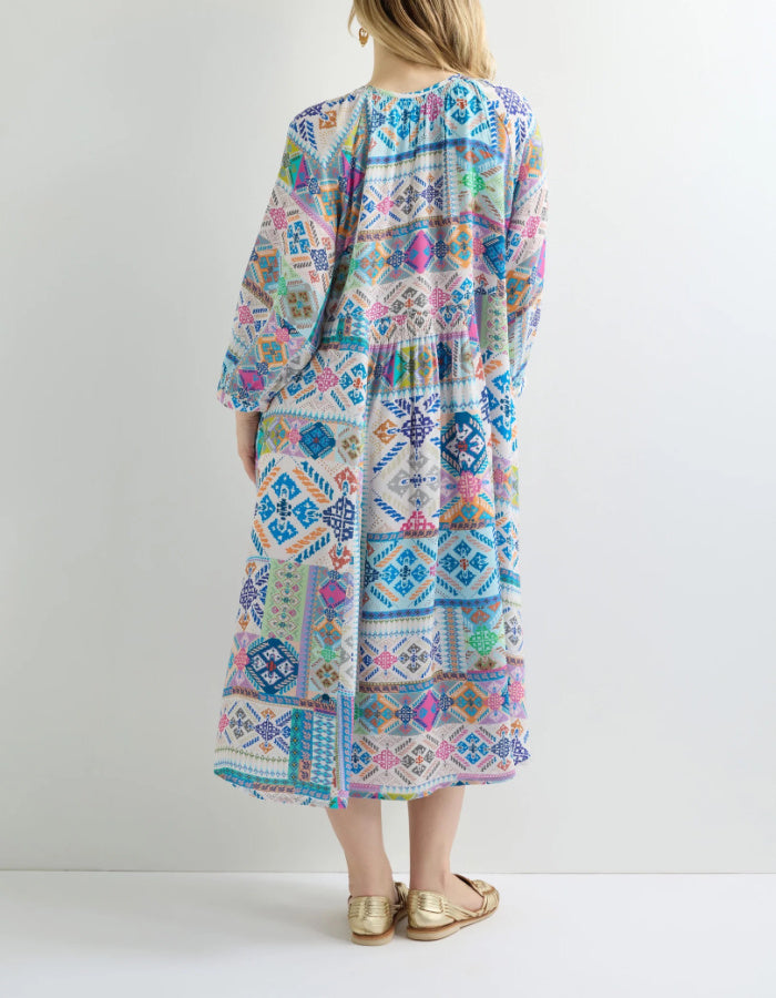 easy style loose fit summer dress with 3/4 length sleeves and a loose flow fit in a soft pastel bright