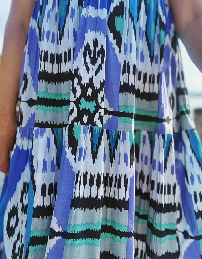 tiered maxi length sleeveless cotton summer dress with blue turquoise and black Ikat print