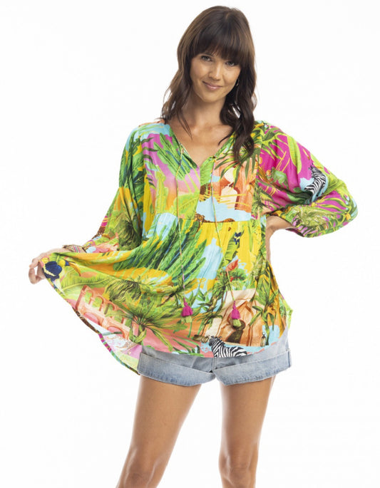 boho loose fit top with balloon sleeves in tropical print that includes zebras, flamingoes and cheetahs