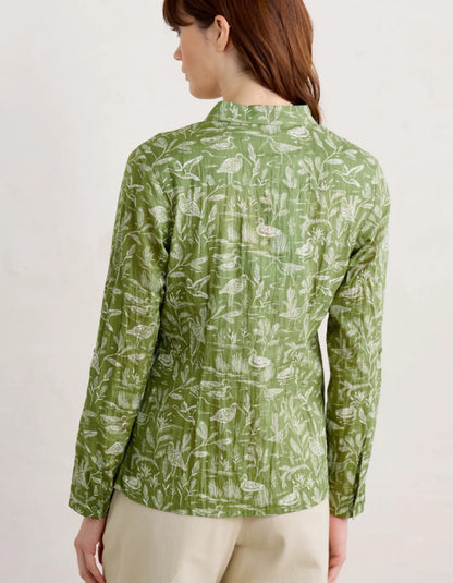 cotton crinkle shirt in mossy green with white bird print. roll up for convenience