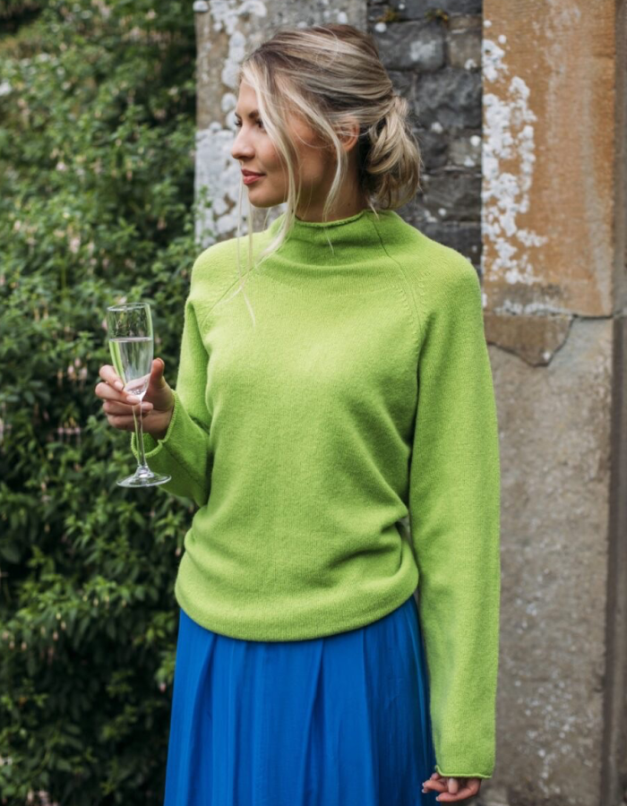 lime merino lambswool raglan smock shaped jumper with roll over turtle neckline and rolled cuffs and hem. loose fit, easy style