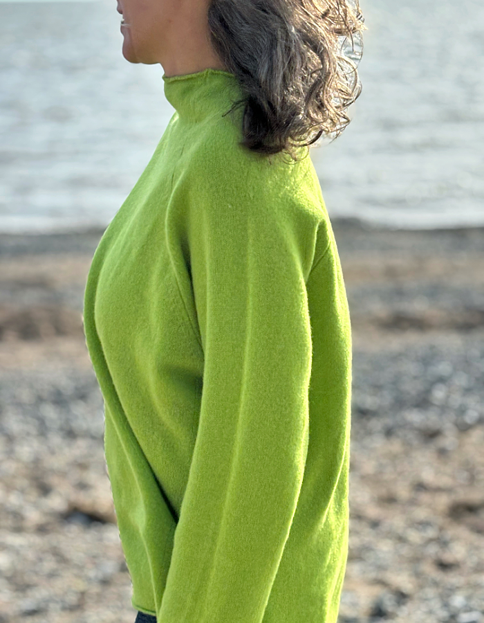 lime merino lambswool raglan smock shaped jumper with roll over turtle neckline and rolled cuffs and hem. loose fit, easy style