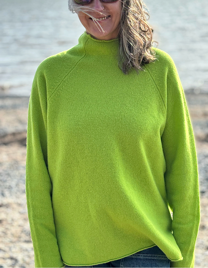 lime merino lambswool raglan smock shaped jumper with roll over turtle neckline and rolled cuffs and hem. loose fit, easy style