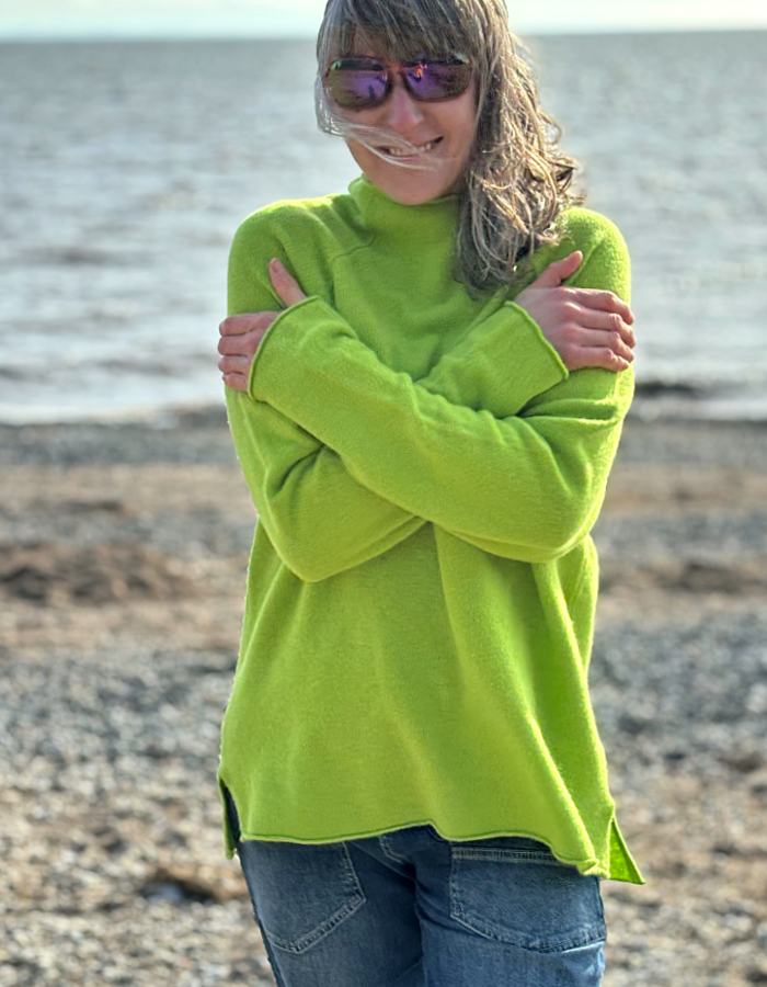 lime merino lambswool raglan smock shaped jumper with roll over turtle neckline and rolled cuffs and hem. loose fit, easy style