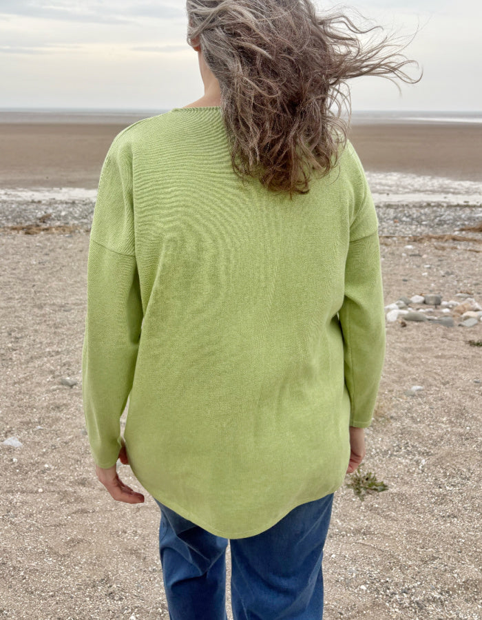 relax fit lime green cotton sweater with scoop neckline and high low hemline