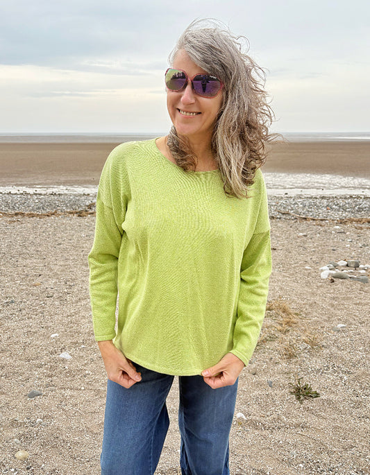relax fit lime green cotton sweater with scoop neckline and high low hemline