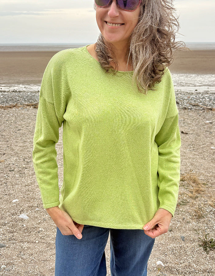 relax fit lime green cotton sweater with scoop neckline and high low hemline